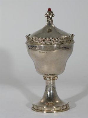 Appraisal: An Omar Ramsden silver cup and cover the cup of