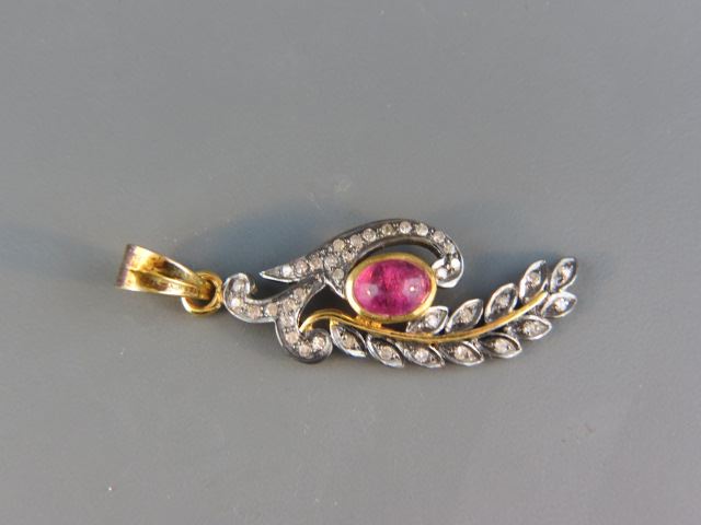 Appraisal: Pink Tourmaline and Diamond Pendant carat cabachon and round diamonds