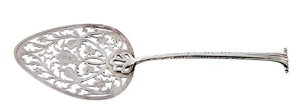 Appraisal: A GEORGE III IRISH SILVER CAKE SLICE BY WILLIAM BOND