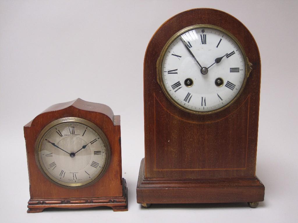 Appraisal: An Edwardian mahogany cased Mantle Clock with white enamel circular