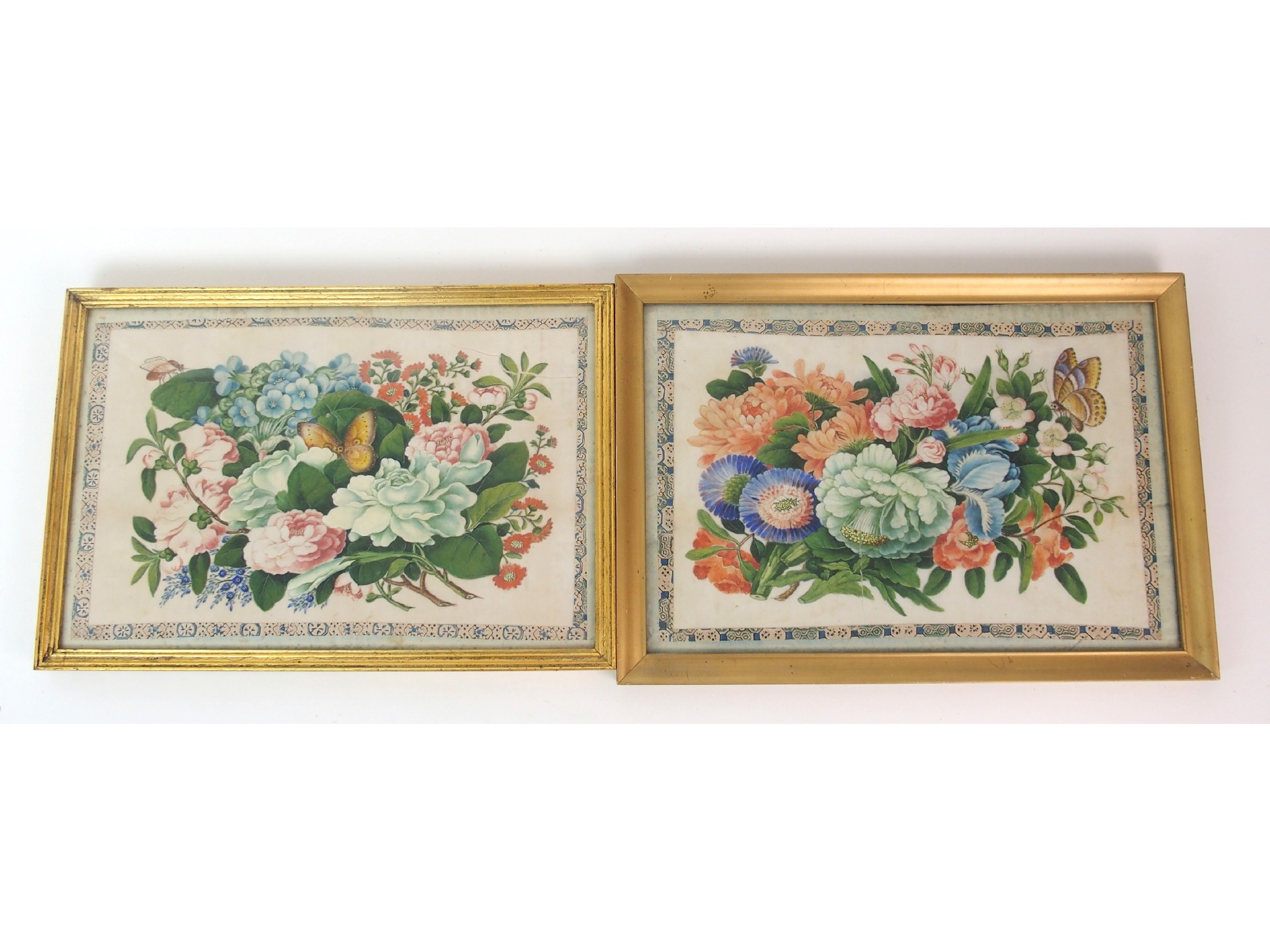 Appraisal: Two Chinese botanical watercolourson piff with butterflies x cm and