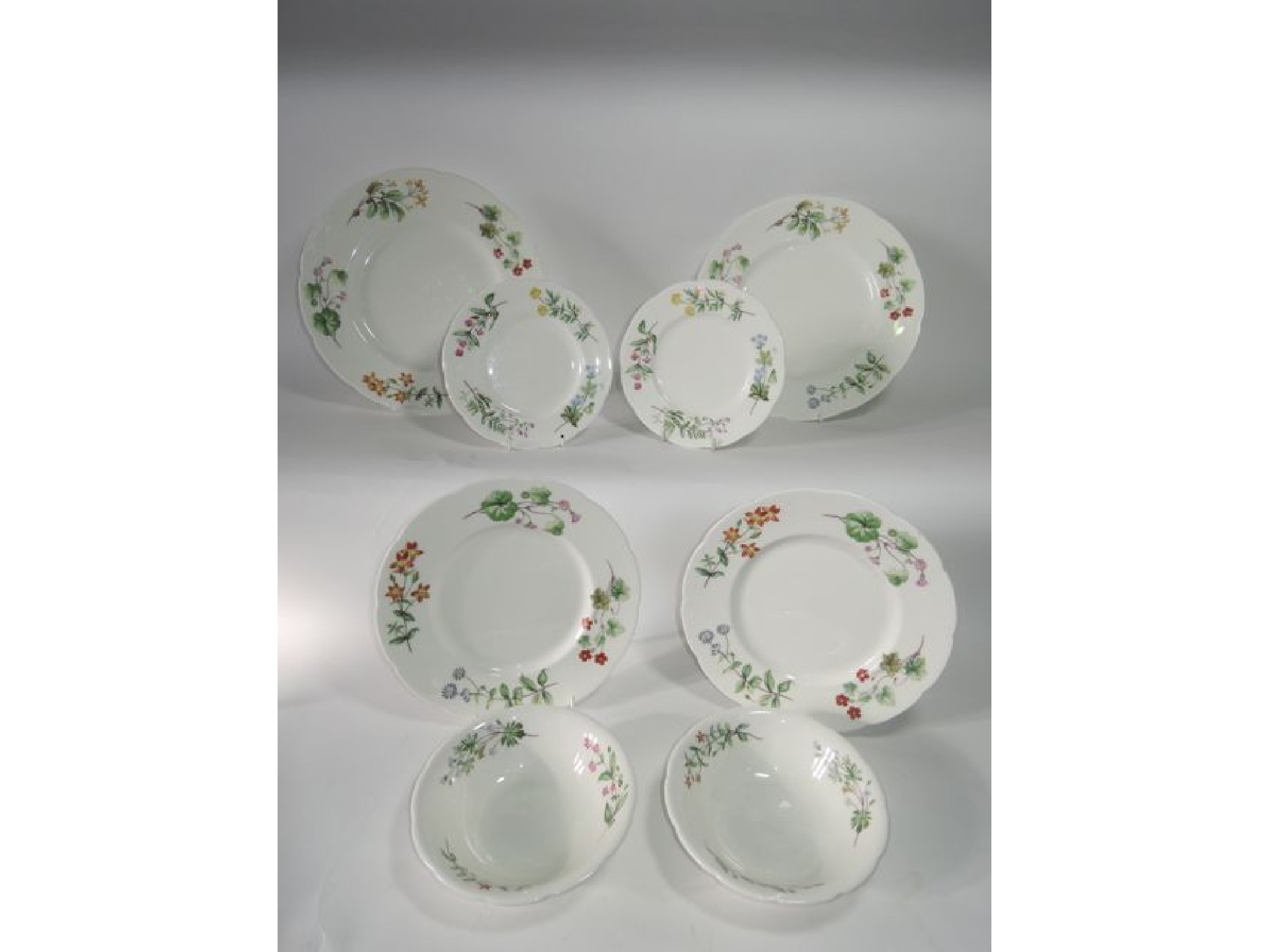 Appraisal: A collection of Minton Meadow pattern dinner wares with printed