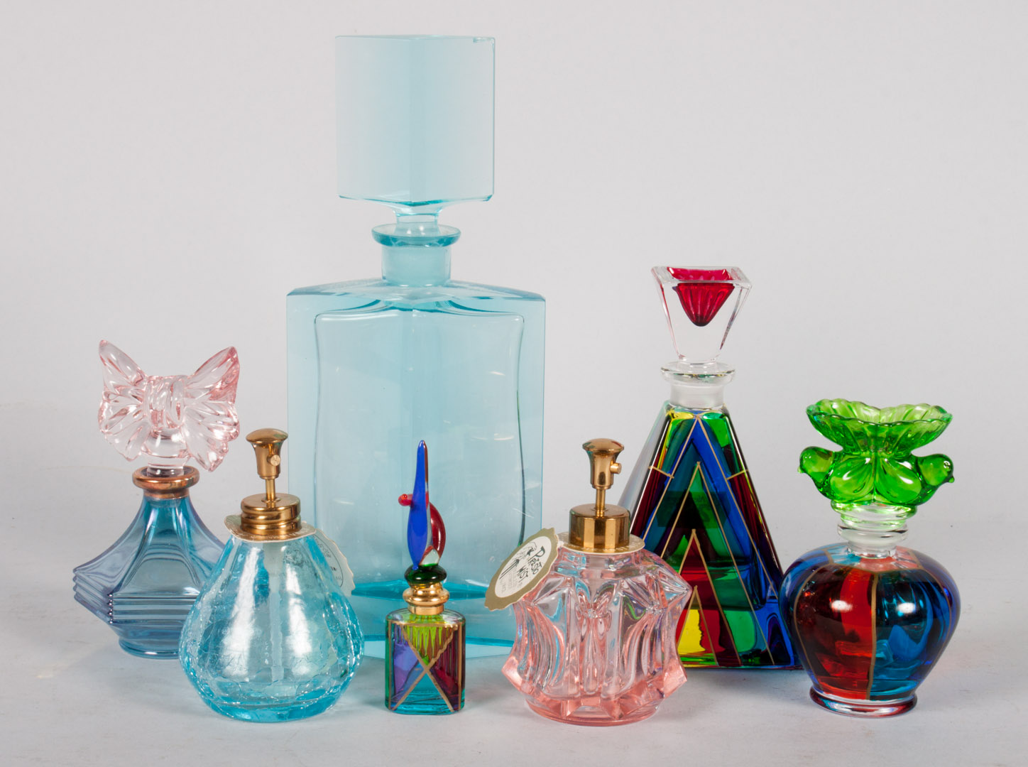 Appraisal: Assorted colored glass scent bottles atomizers solid color and multicolored