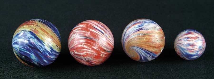 Appraisal: LOT OF ONIONSKIN MARBLES four-panel marble features two panels of