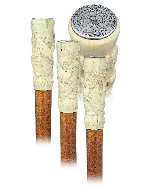 Appraisal: Bone and Silver Hunting Cane Ca -Straight bone handle turned