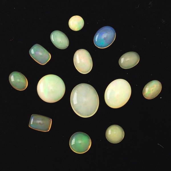 Appraisal: MULTIPLE UNMOUNTED CT TOTAL MULTI-SHAPE OPAL GEMSTONES Fourteen unmounted ct