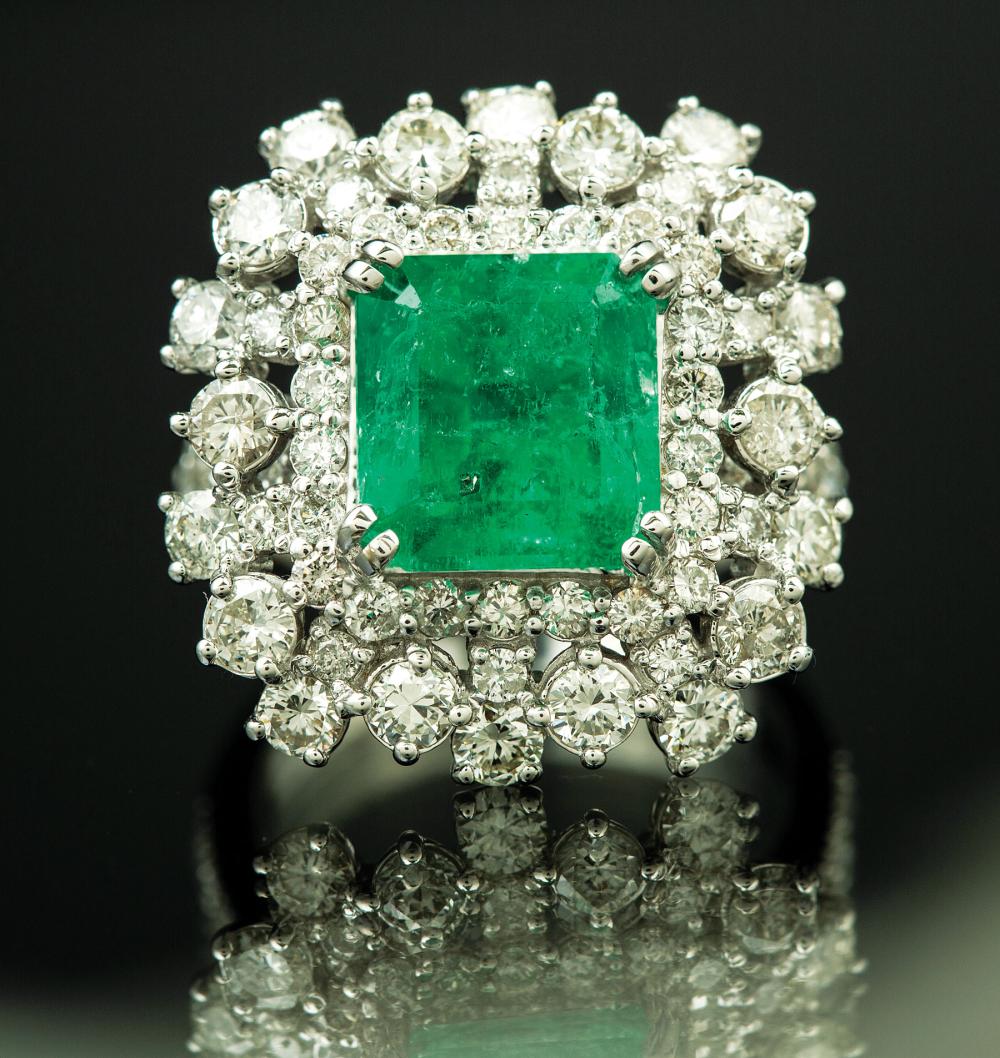 Appraisal: kt White Gold Emerald and Diamond Cluster Ring set with