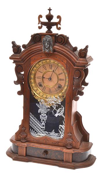 Appraisal: AN ANSONIA MONARCH MANTEL CLOCK adorned with double lions head