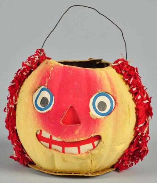 Appraisal: Yellow Red Paper Mache Apple Jack-O-Lantern Description Unusual shape Some