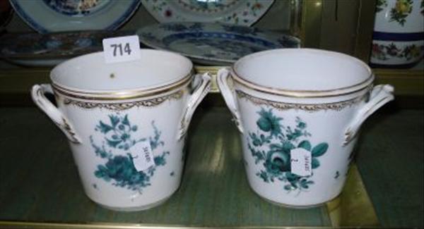 Appraisal: A pair of French porcelain floral decorated cache pots