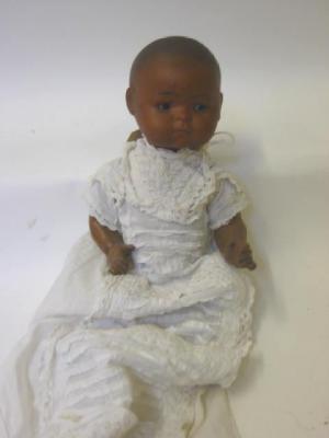 Appraisal: A Theodor Recknagel bisque head Mulatto doll with fixed brown