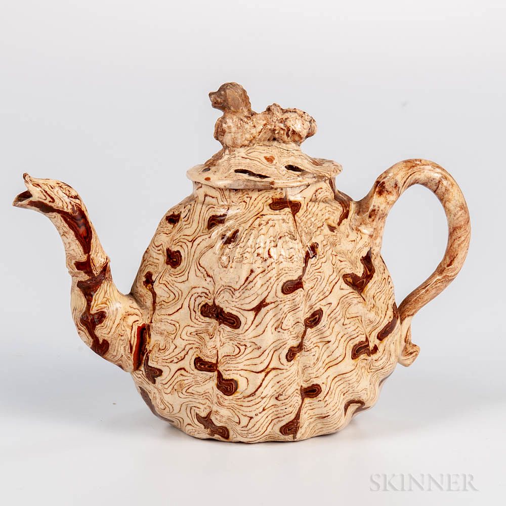 Appraisal: Staffordshire Solid Agate Pecten Shell Teapot and Cover Staffordshire Solid