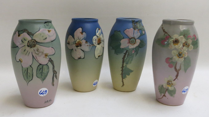 Appraisal: FOUR WELLER ART POTTERY VASES having matte glazed floral patterns