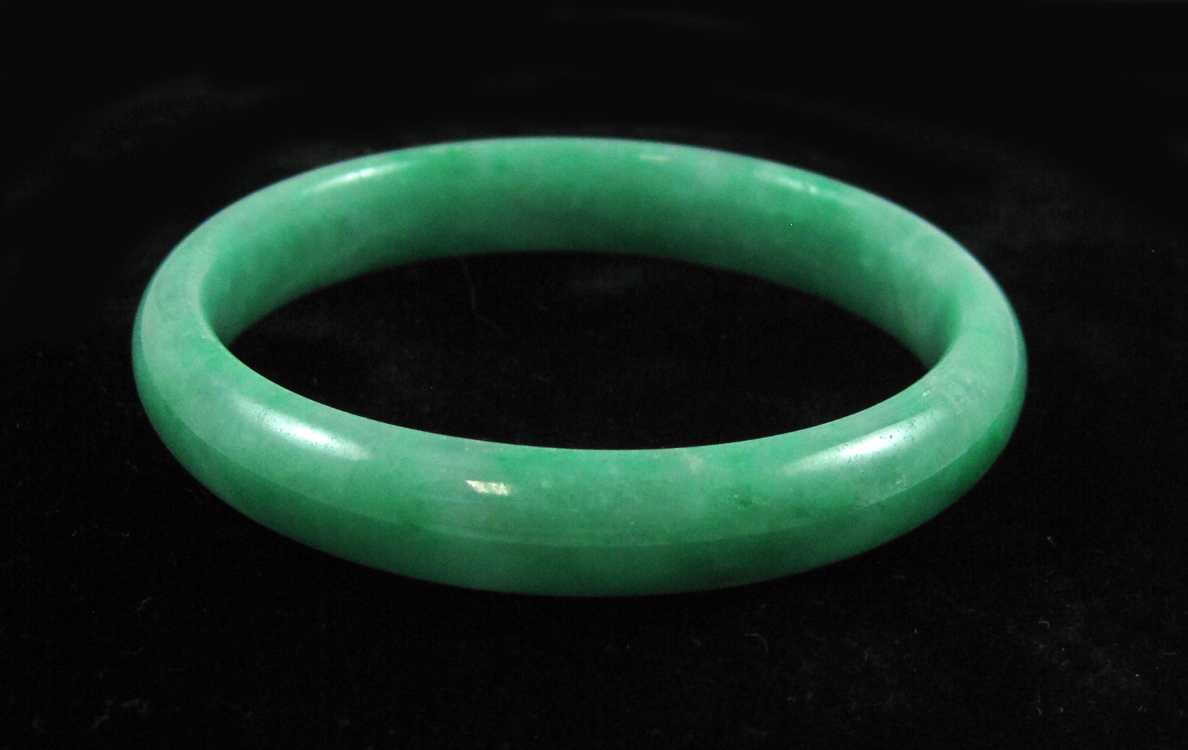 Appraisal: ROUND GREEN JADE BANGLE BRACELET weighing grams measuring approximately mm