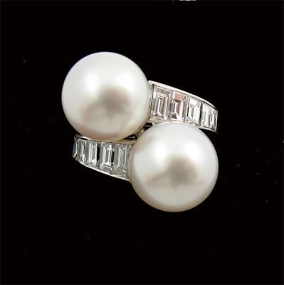 Appraisal: A diamond and cultured pearl platinum ring by Van Cleef