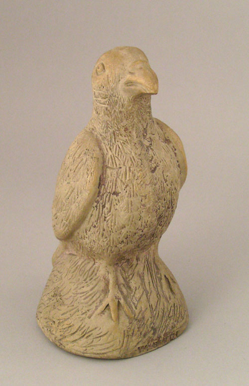 Appraisal: American stoneware molded and hand carved figure of a pigeon