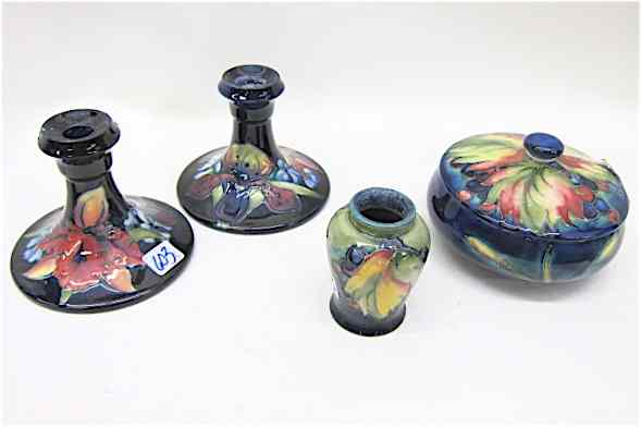 Appraisal: FOUR MOORCROFT POTTERY PIECES c - in the ''Grape Leaf''