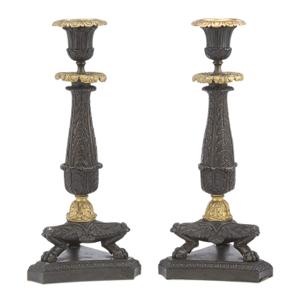 Appraisal: Pair of Louis Philippe Style Gilt and Patinated-Bronze Candlesticks Each