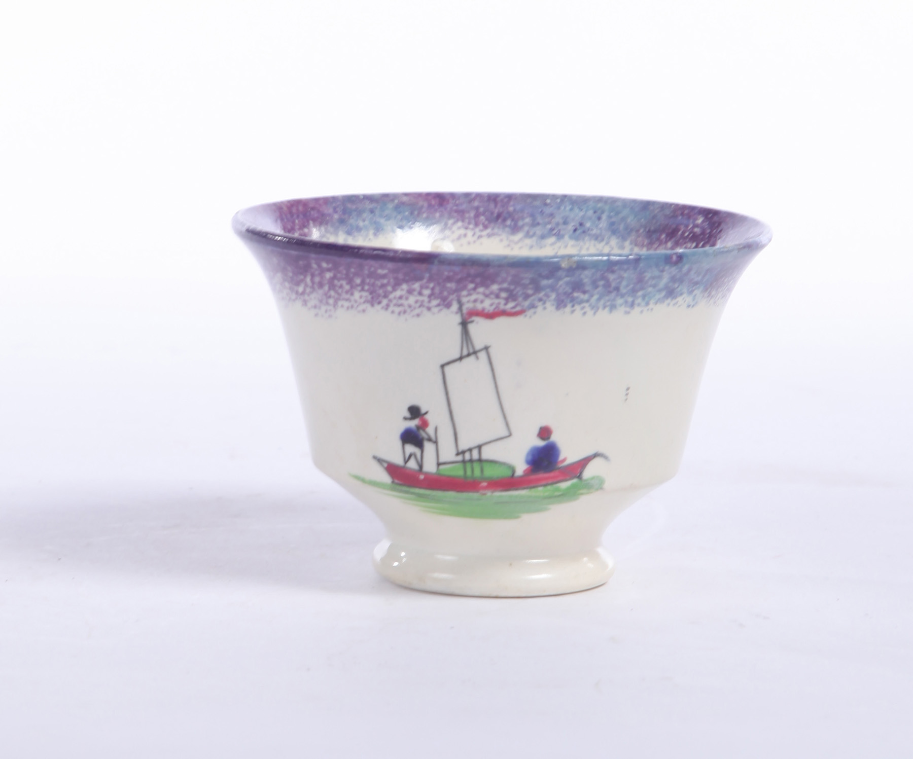 Appraisal: SPATTERWARE HANDLELESS CUP England nd quarter- th century Two men