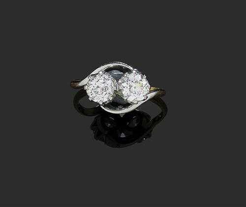 Appraisal: DIAMOND RING Sweden Platinum and yellow gold Set with two