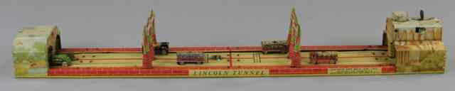 Appraisal: LINCOLN TUNNEL Unique Art Mfg lithographed tin clockwork action allows