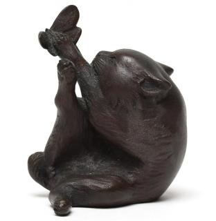 Appraisal: Small Japanese Bronze of Cat with Butterfly The agile feline