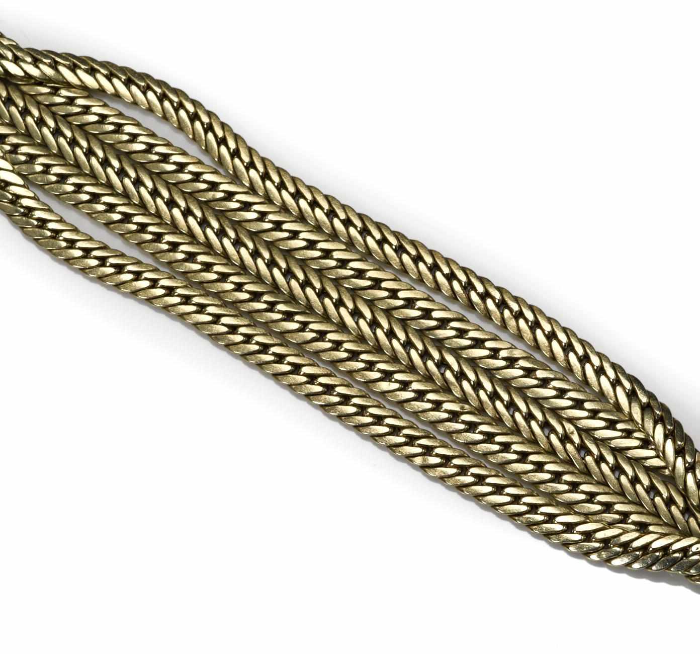 Appraisal: A fourteen karat gold five-strand bracelet UnoAErre signed Uno A-Erre