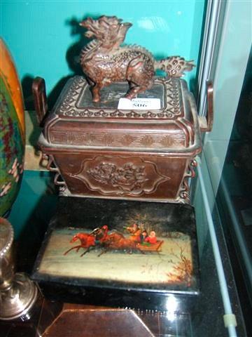 Appraisal: A Chinese bronze box with hinged lid and dragon finial