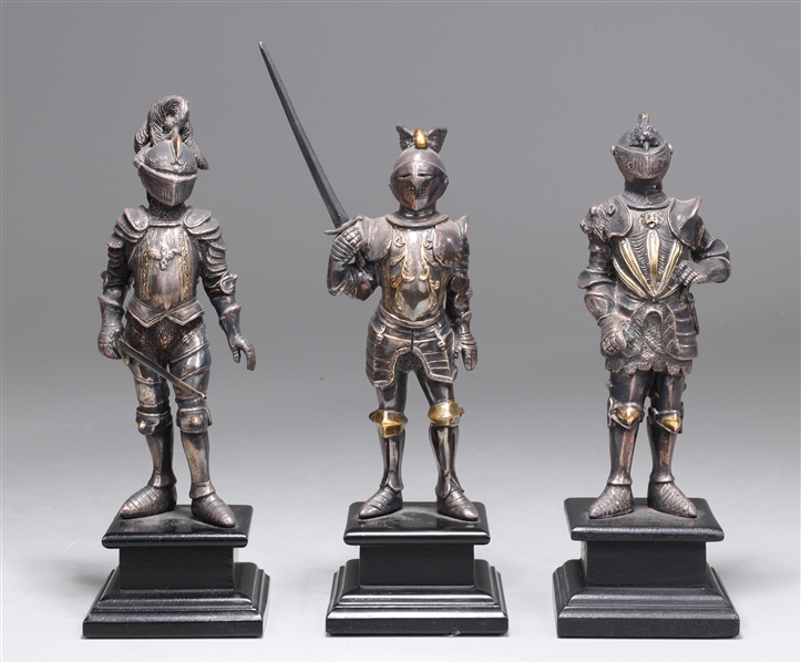 Appraisal: Group of three Italian weighted sterling silver knights each in