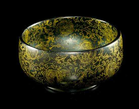 Appraisal: A Chinese Gilt Decorated Jade Bowl of low form having