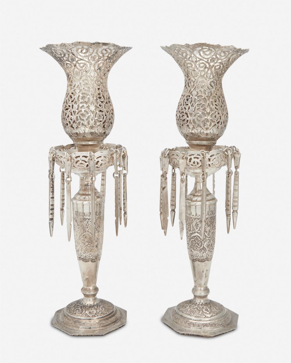 Appraisal: A pair of Persian silver candlesticks th Century Each with