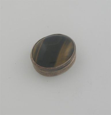 Appraisal: A George III oval vinaigrette with a mounted tiger's eye