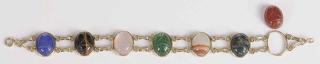 Appraisal: kt Scarab Bracelet with seven assorted scarab carved gemstones links