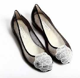 Appraisal: Chanel Ballerina flat shoes with black mesh and cream satin