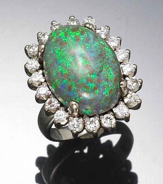 Appraisal: A black opal diamond and k white gold ring size