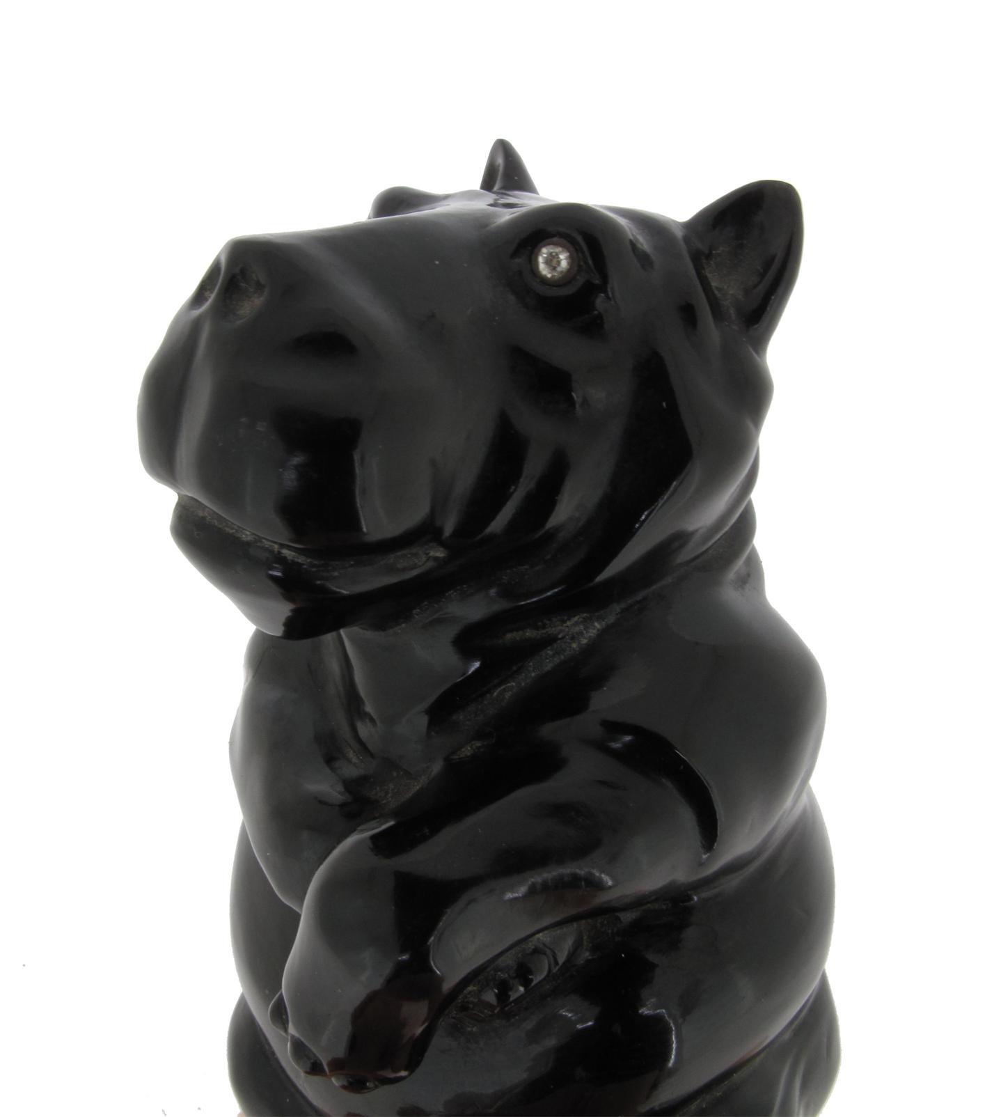 Appraisal: A carved hardstone figure of a seated hippopotamus