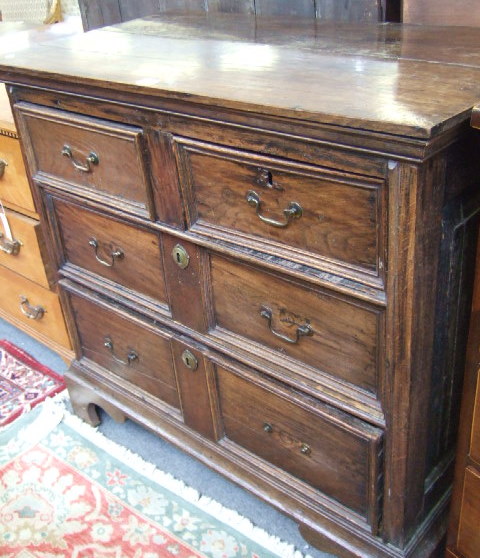 Appraisal: A Jacobean oak chest of two short and two long