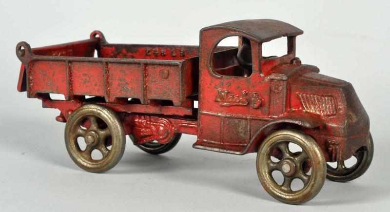 Appraisal: Cast Iron Arcade Mack Dump Truck Toy American Nickel wheels