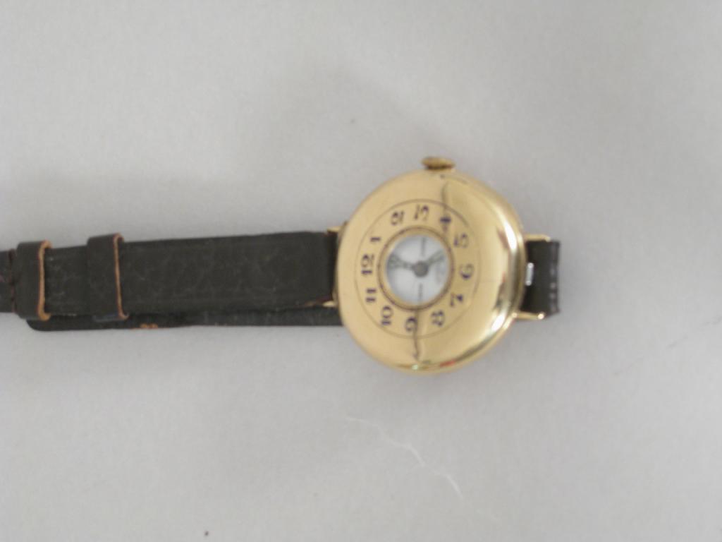 Appraisal: An Edward VII ct gold cased Half Hunter Wristwatch with