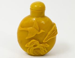 Appraisal: MUSTARD YELLOW GLASS SNUFF BOTTLE Chinese Carved with a crane