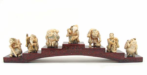 Appraisal: A set of seven Chinese tinted ivory miniature carvings depicting