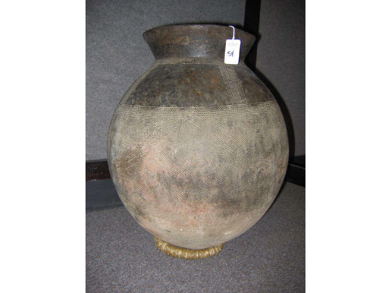 Appraisal: AFRICAN EARTHENWARE STORAGE JAR Ivory Coast with incised decoration h