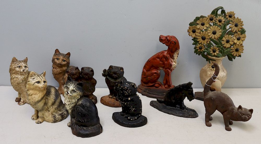 Appraisal: Large Grouping Of Approx Cast Iron Door Stops From the