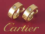 Appraisal: Cartier A pair of Swiss hallmarked carat gold Love earrings