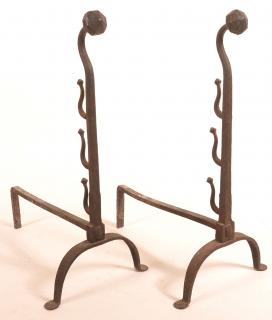 Appraisal: Pair of th Century Wrought Iron Andirons Faceted finial and