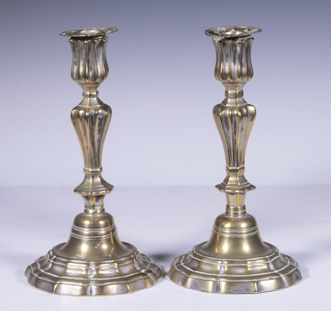 Appraisal: PAIR OF TH C CHIPPENDALE CANDLESTICKS BRASS WITH REMNANTS OF