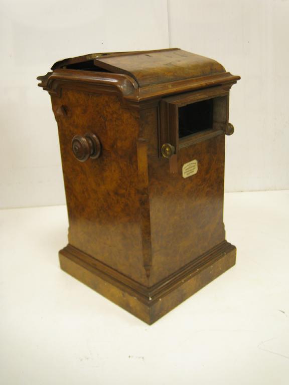 Appraisal: A walnut cased Improved Stereoscope Viewer maker Gardner Co Glasgow