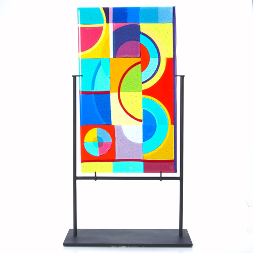 Appraisal: DOROTHY HAFNER Glass plaque in polychrome cubist pattern with internal