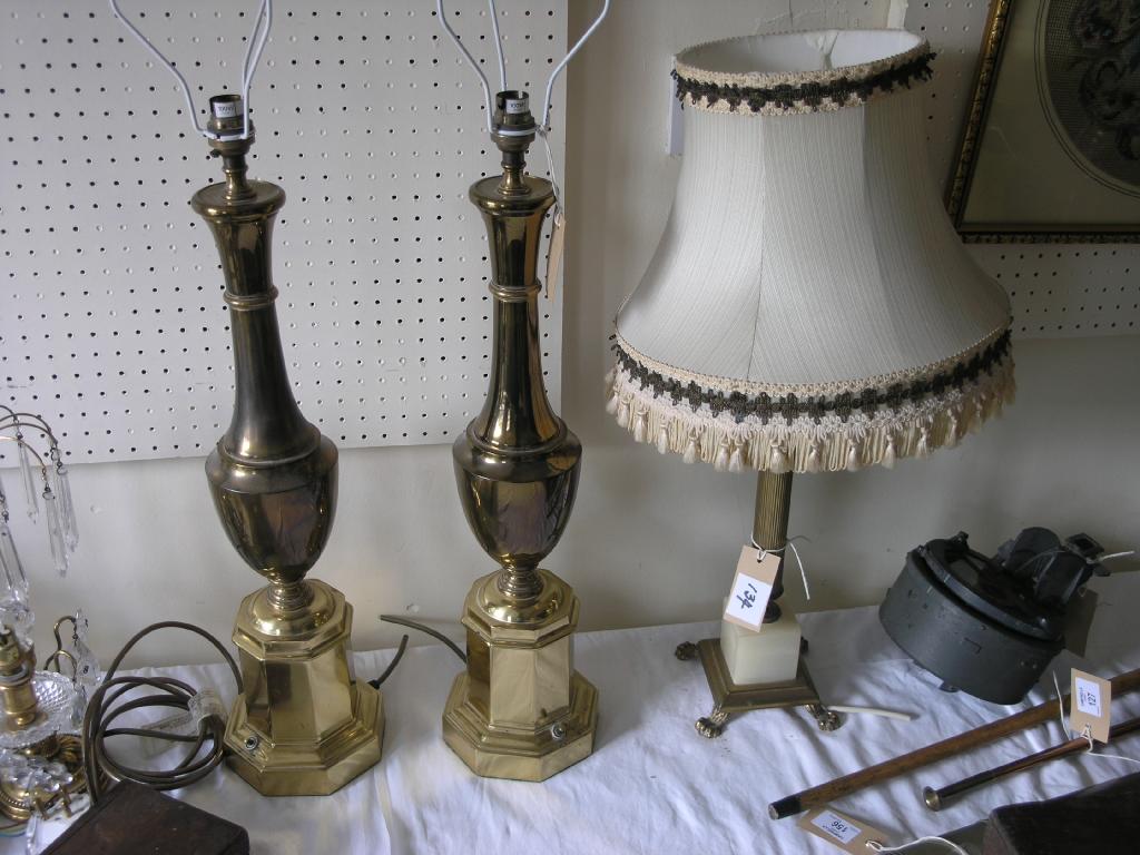 Appraisal: A large pair of brass urn shape table lamps on