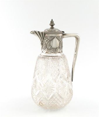 Appraisal: A Victorian silver mounted claret jug by Henry Atkin Sheffield